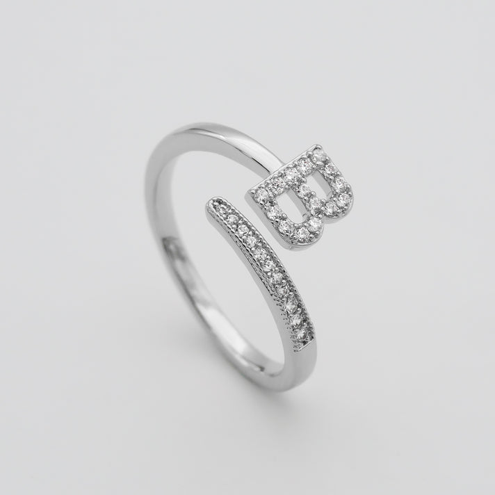 Silver Paved, adjustable Icy initial ring in B