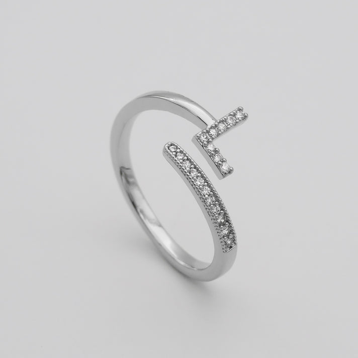 Silver Paved, adjustable Icy initial ring in L