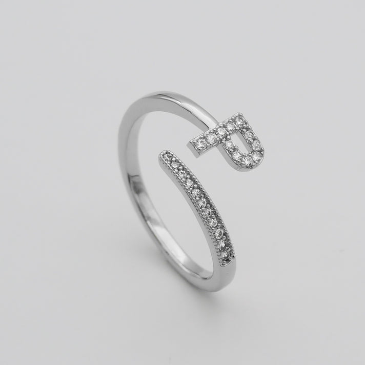 Silver Paved, adjustable Icy initial ring in P