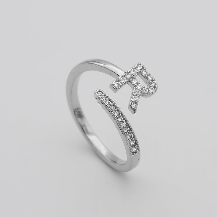 Silver Paved, adjustable Icy initial ring in R