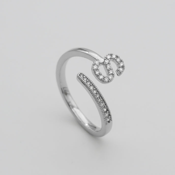 Silver Paved, adjustable Icy initial ring in S