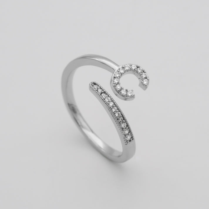 Silver Paved, adjustable Icy initial ring in C