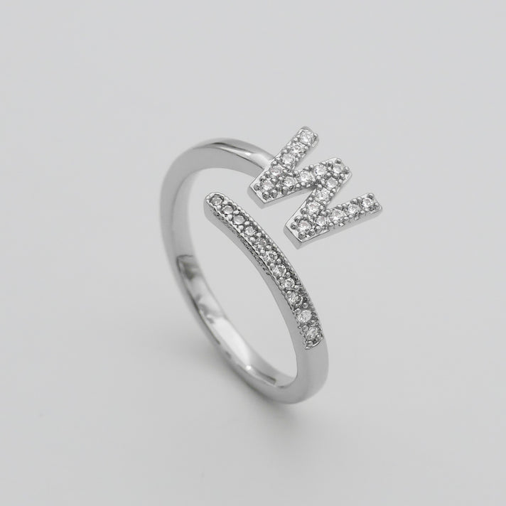 Silver Paved, adjustable Icy initial ring in W