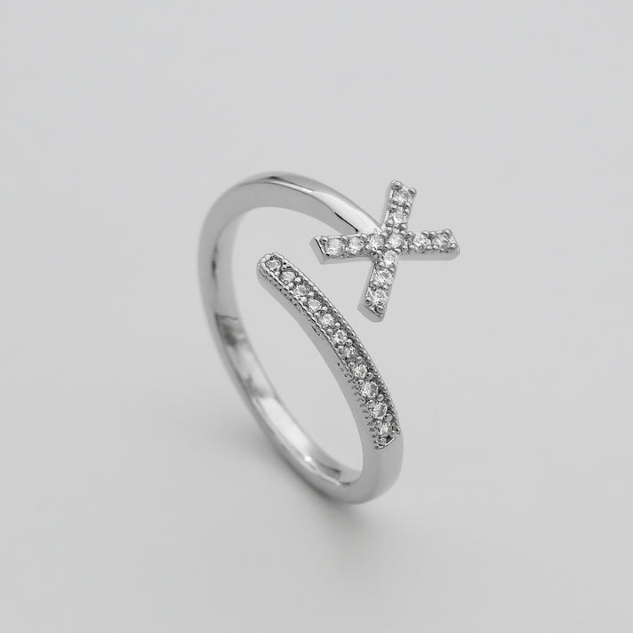 Silver Paved, adjustable Icy initial ring in X