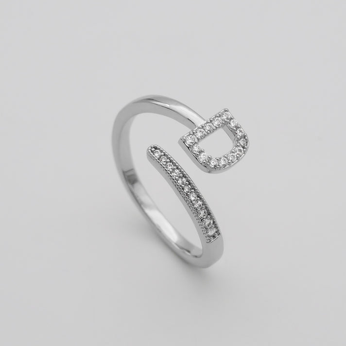 Silver Paved, adjustable Icy initial ring in D