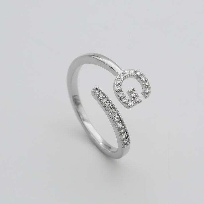 Silver Paved, adjustable Icy initial ring in G