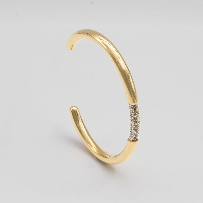 image of gold bangle with clear cz stones from prya