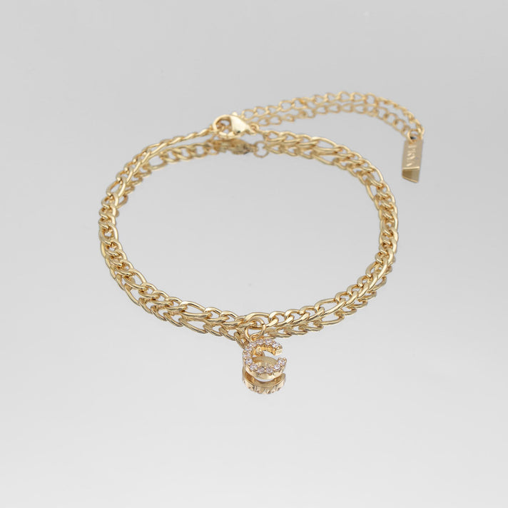icy Initial Anklet in gold on figaro chain from PRYA Jewellery UK