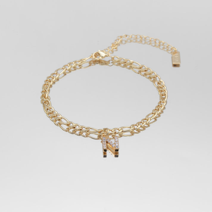 icy Initial Anklet in gold on figaro chain from PRYA Jewellery UK