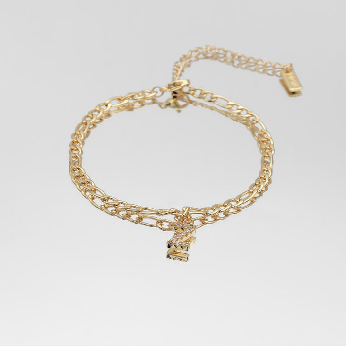 icy Initial Anklet in gold on figaro chain from PRYA Jewellery UK