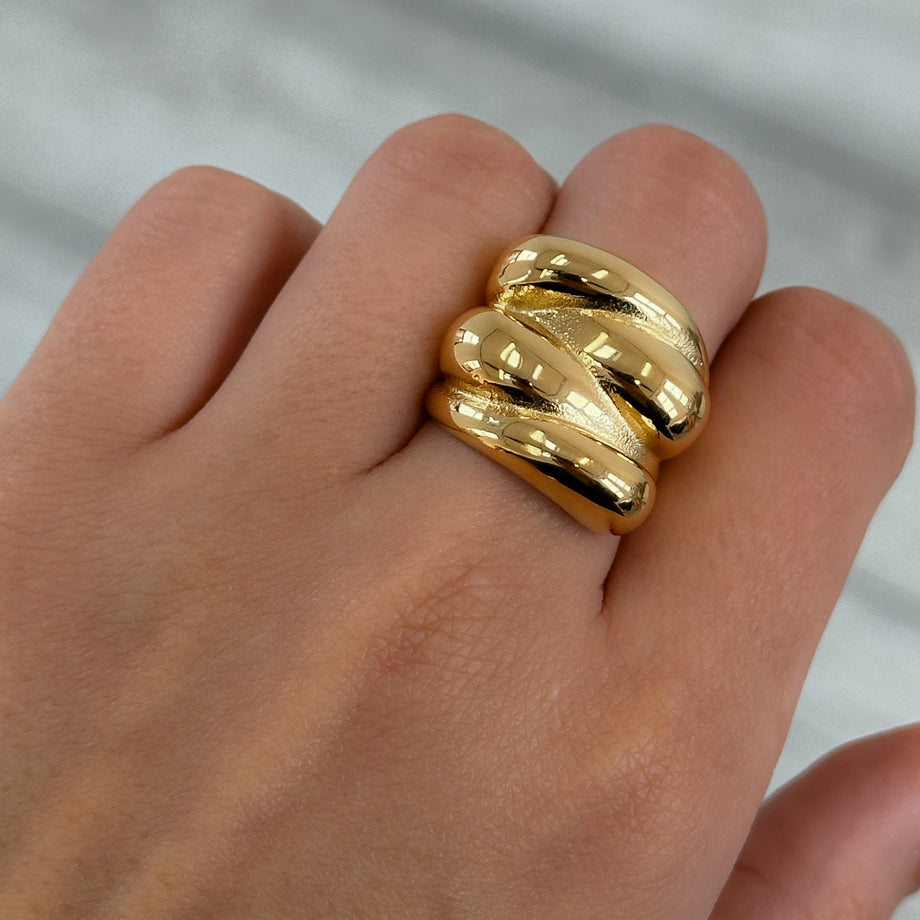 model wearing Indie Chunky Ring, a Multi-Dome Chunky Ring inspired by retro geometric designs, crafted in 18k Gold plated stainless steel from prya