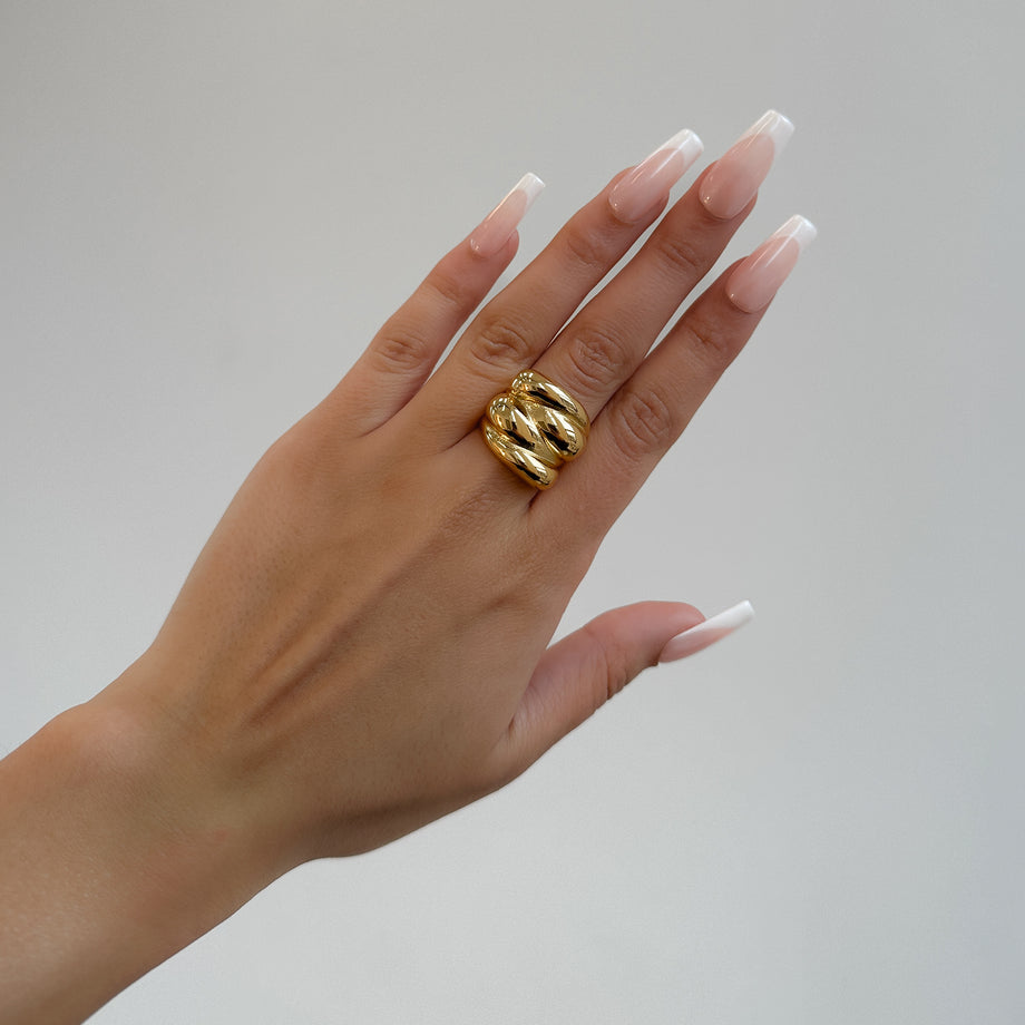 model wearing Indie Chunky Ring, a Multi-Dome Chunky Ring inspired by retro geometric designs, crafted in 18k Gold plated stainless steel from prya