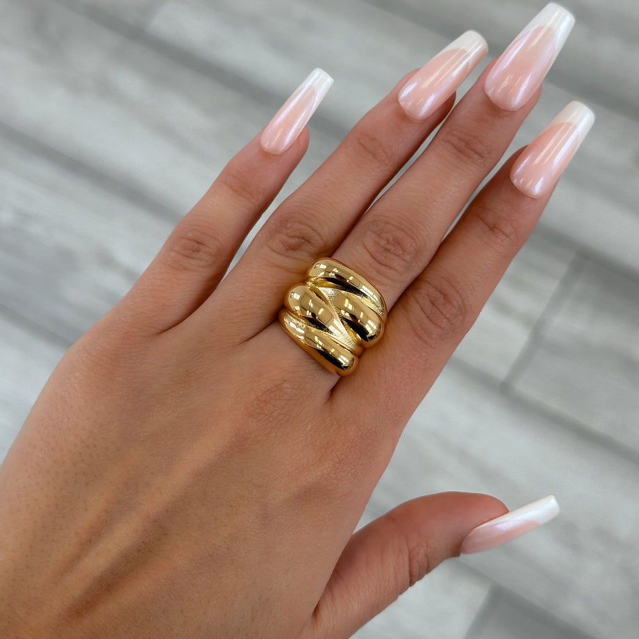 model wearing Indie Chunky Ring, a Multi-Dome Chunky Ring inspired by retro geometric designs, crafted in 18k Gold plated stainless steel from prya