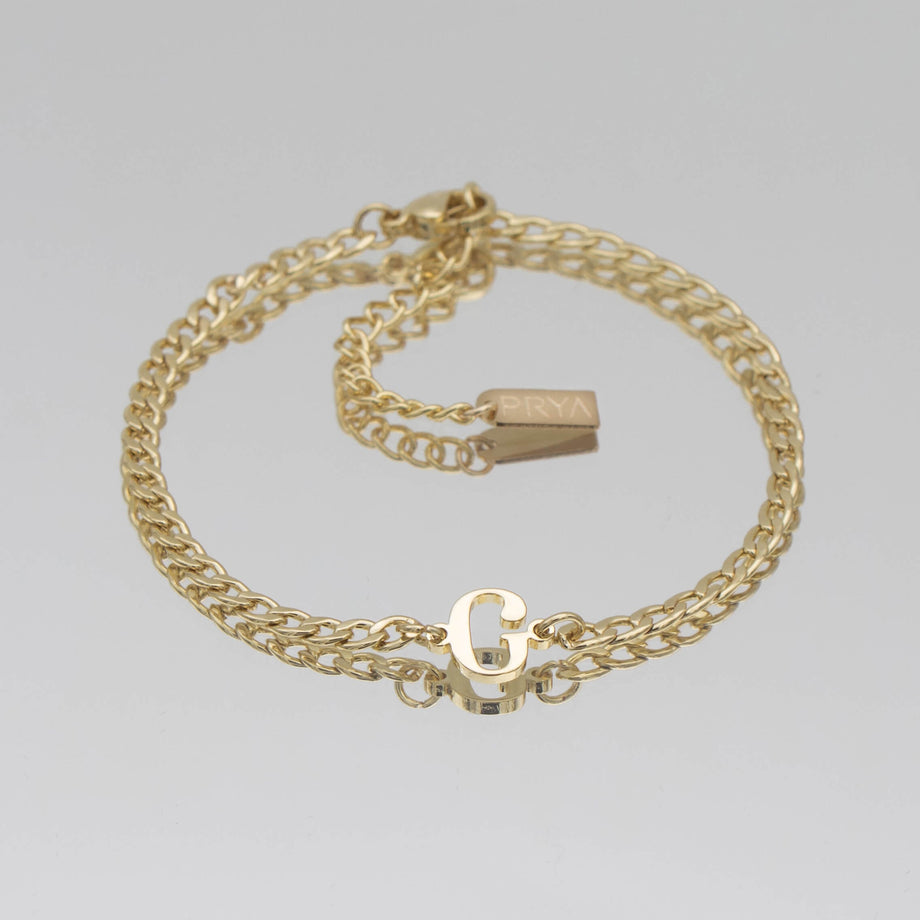 Dubai initial bracelet with cuban chain in 18k gold plating from prya