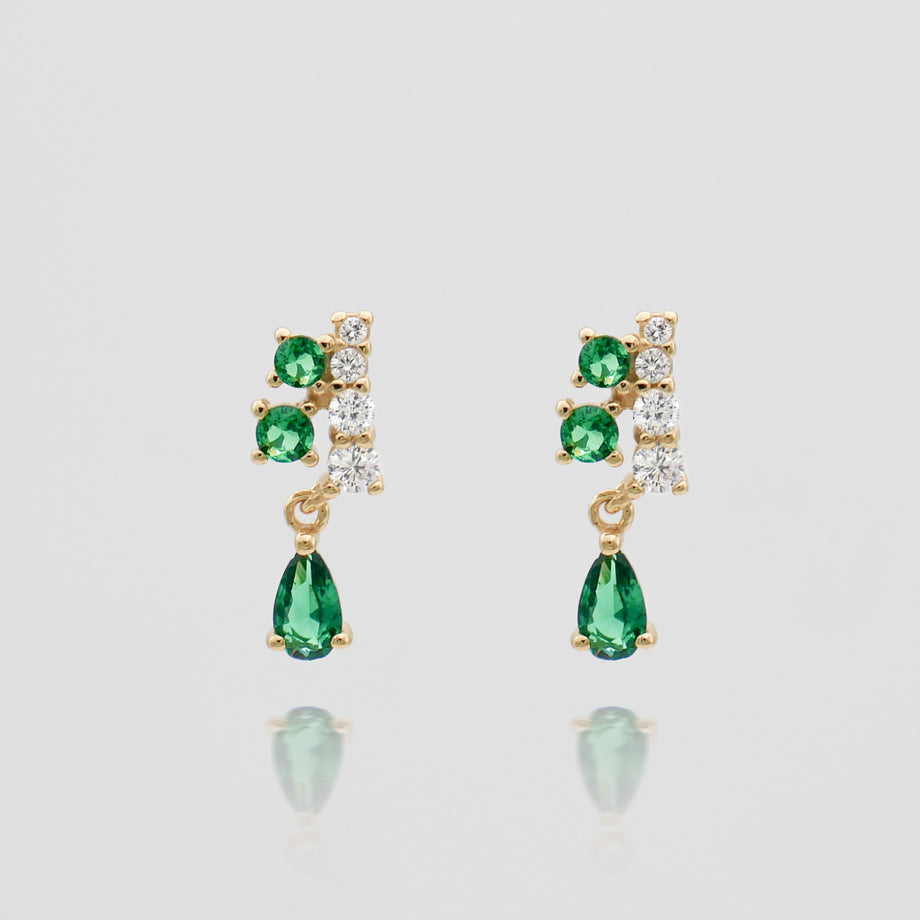 Gold earrings with green and white gemstones.