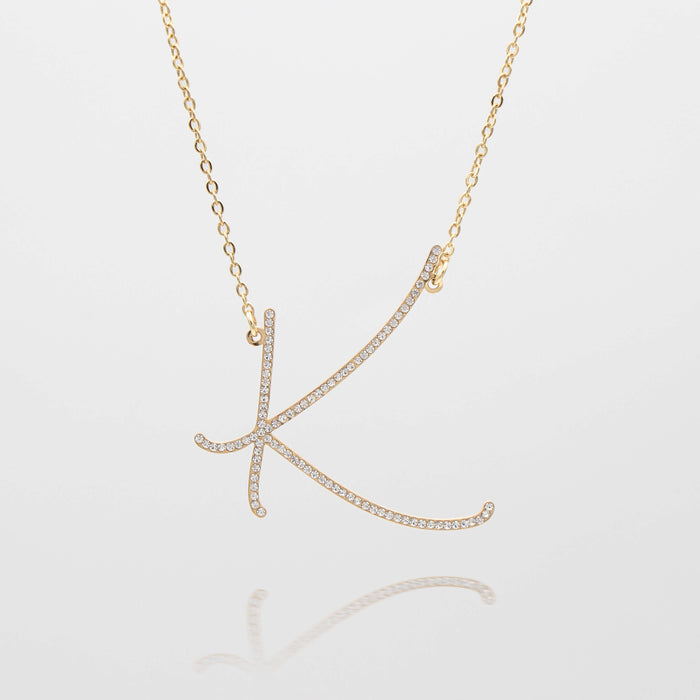 sydney initial necklace with letter 'k' in gold from prya