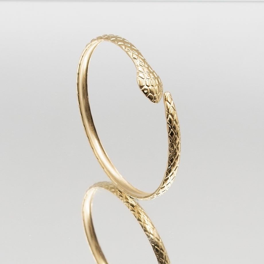 image of gold textured snake bangle from prya