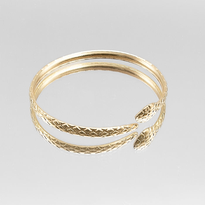 image of gold textured snake bangle from prya