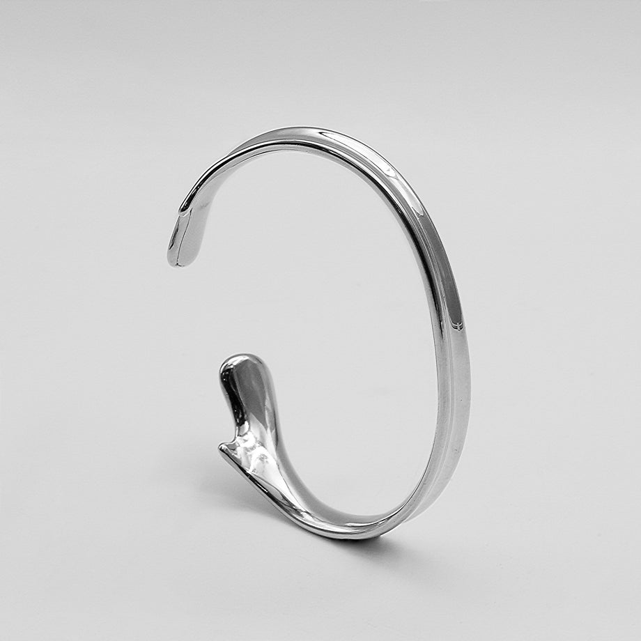 image of silver textured asymmetrical bangle from prya 