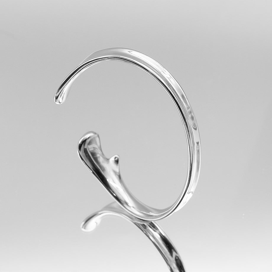 image of silver textured asymmetrical bangle from prya 