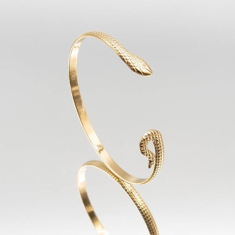 image of gold textured snake bangle from prya 