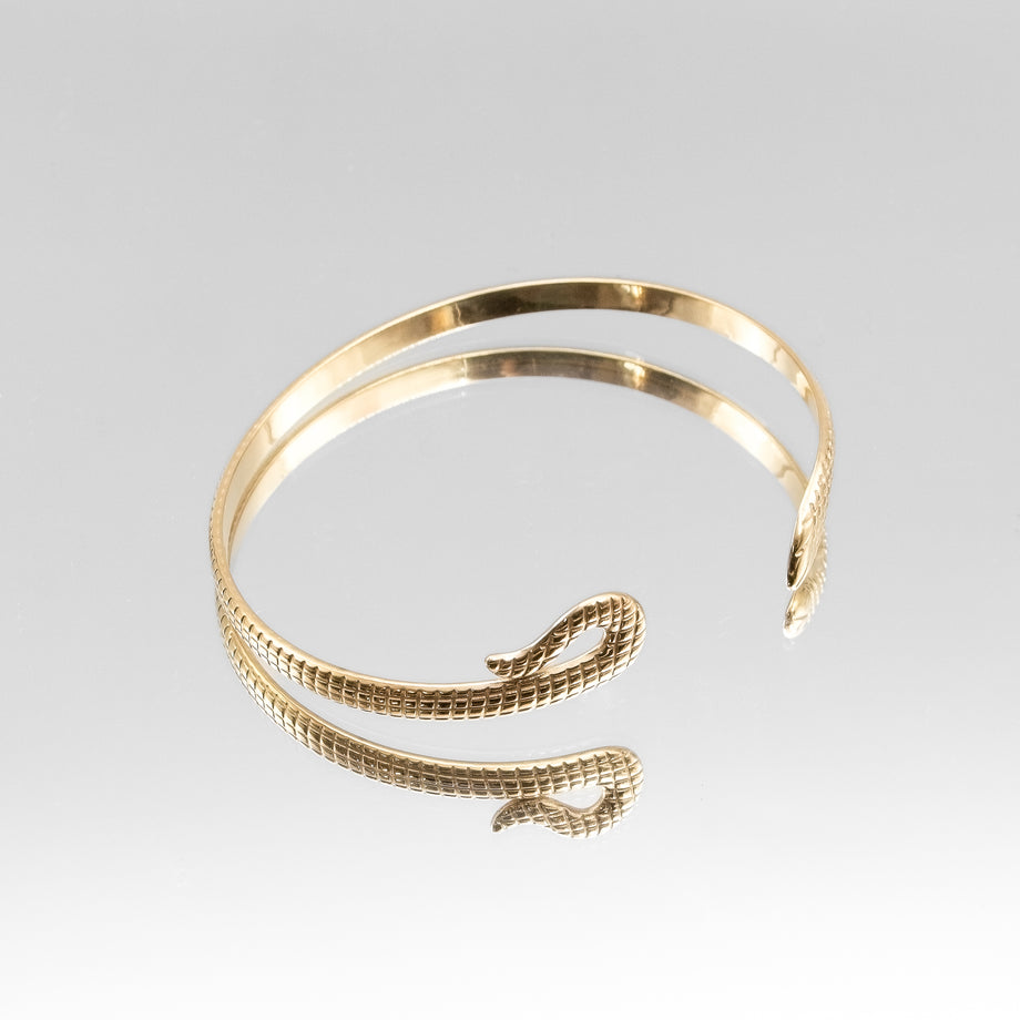 image of gold textured snake bangle from prya 