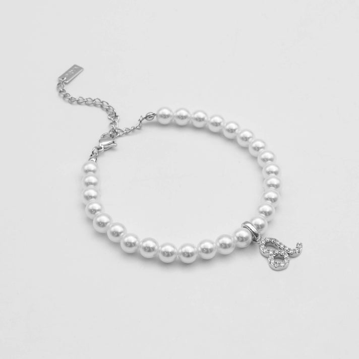 silver-accented pearl anklet with zodiac leo charm, 