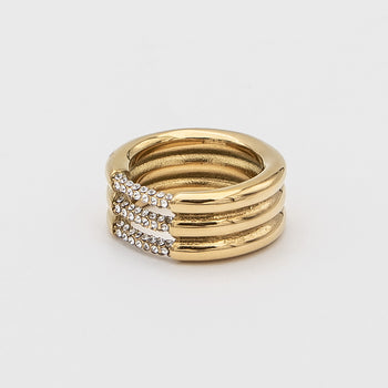 Liana Ring featuring a chunky gold triple band paved with sparkling CZ stones from Prya