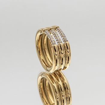 Liana Ring featuring a chunky gold triple band paved with sparkling CZ stones from Prya