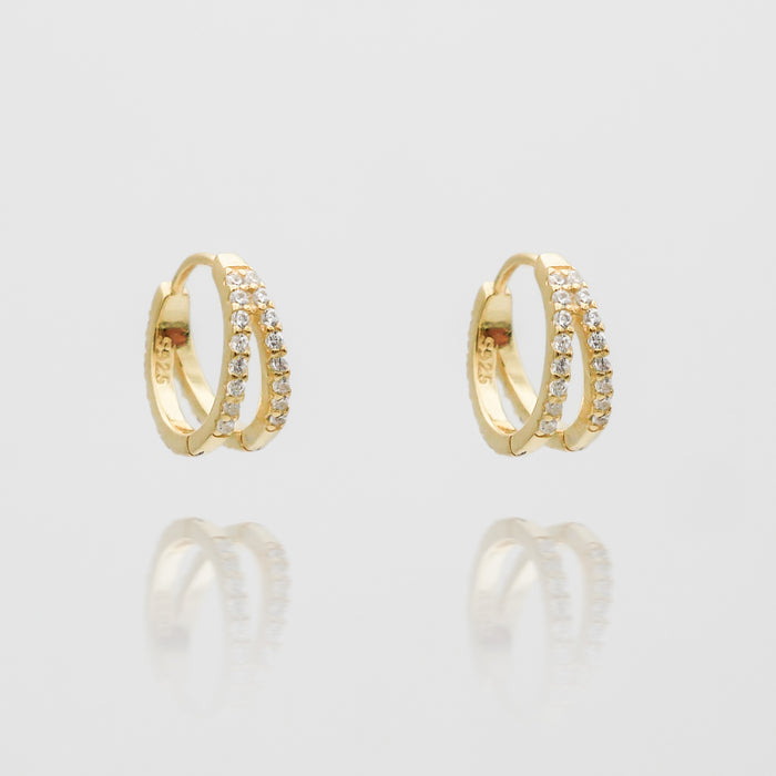 lola hugge earrings paved with clear cz stones from prya