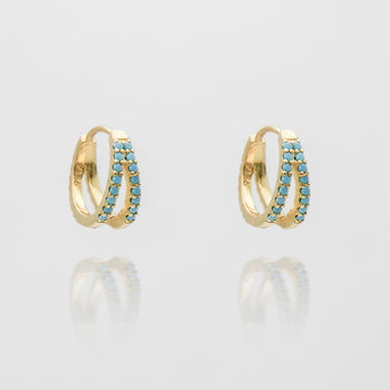 lola hugge earrings paved with blue cz stones from prya