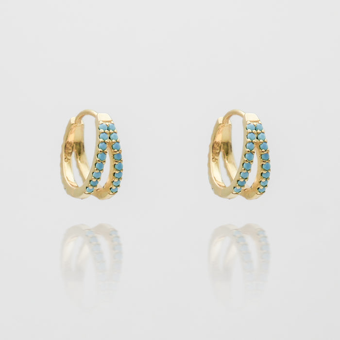 lola hugge earrings paved with blue cz stones from prya