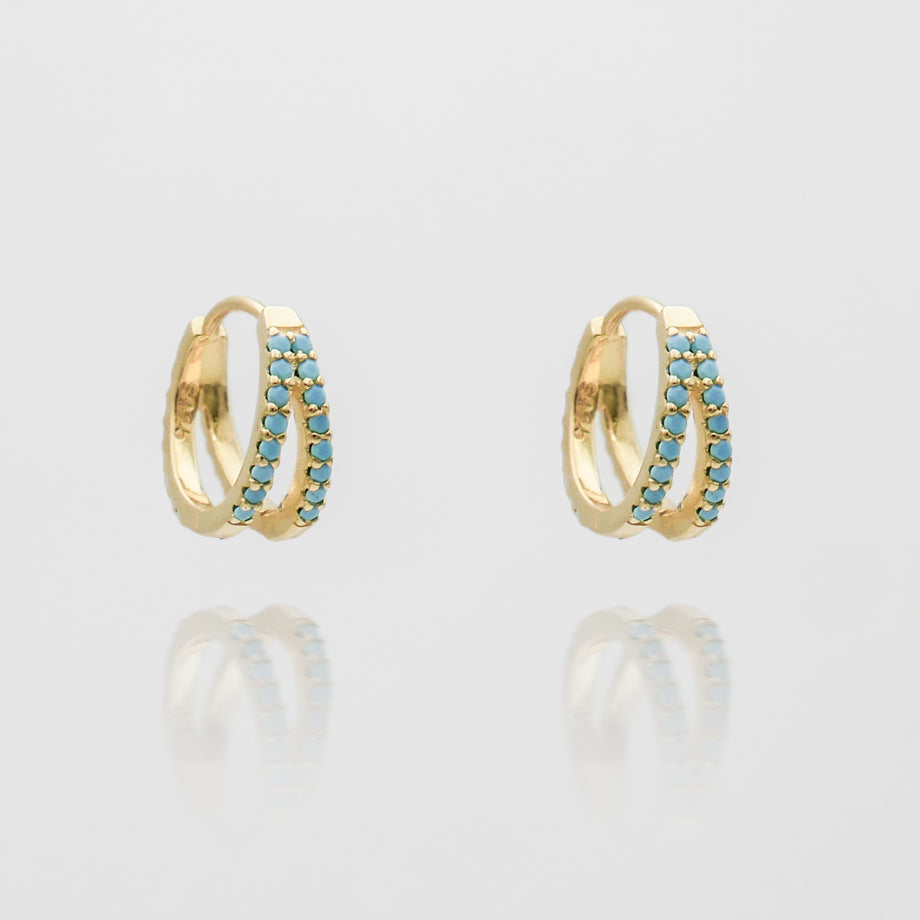 lola hugge earrings paved with blue cz stones from prya
