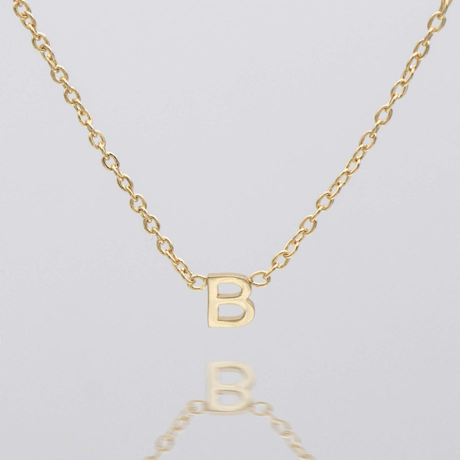 Maia Mini initial necklace in gold by prya