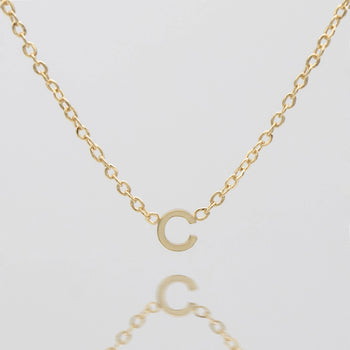 Maia Mini initial necklace in gold by prya