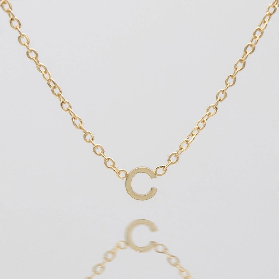 Maia Mini initial necklace in gold by prya