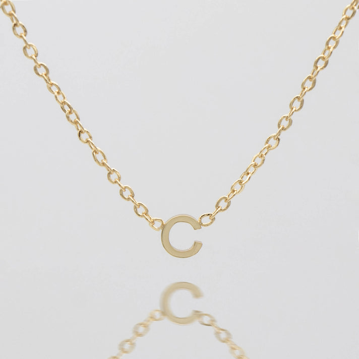 Maia Mini initial necklace in gold by prya