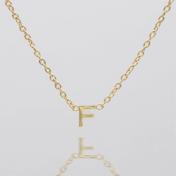 Maia Mini initial necklace in gold by prya