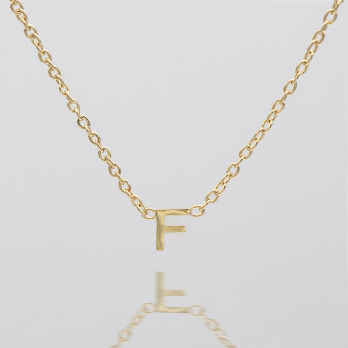 Maia Mini initial necklace in gold by prya