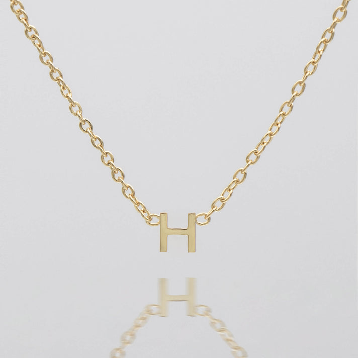 Maia Mini initial necklace in gold by prya