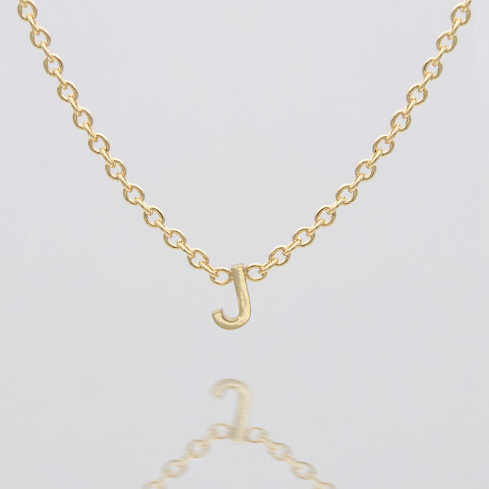 Maia Mini initial necklace in gold by prya