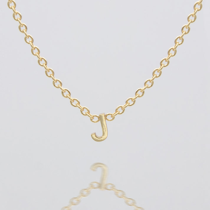 Maia Mini initial necklace in gold by prya