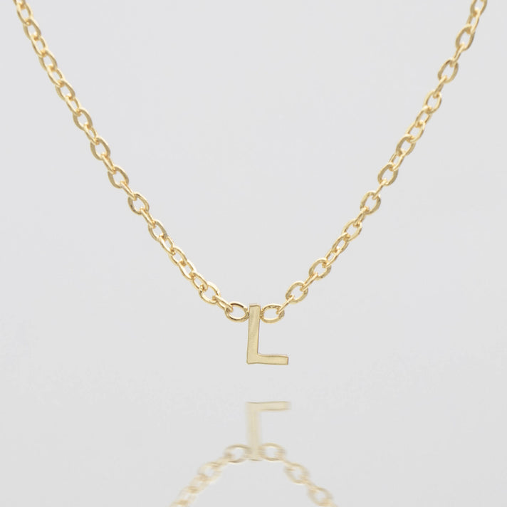 Maia Mini initial necklace in gold by prya