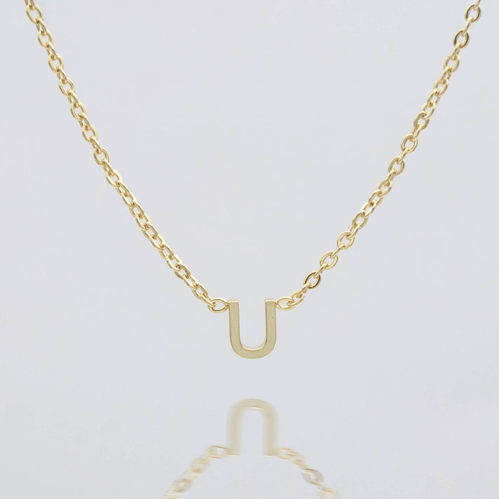 Maia Mini initial necklace in gold by prya