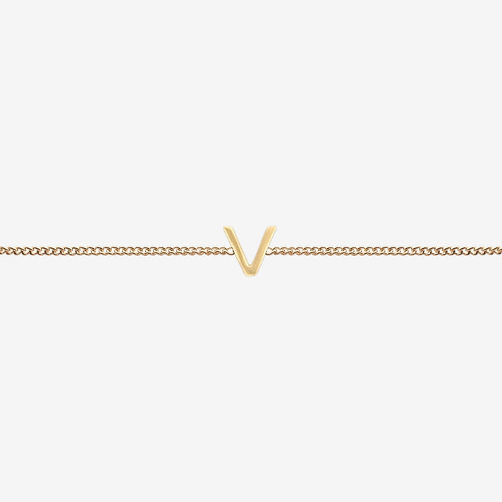  Maia Initial Bracelet with initial pendant on a delicate 18k gold plated chain, perfect accessory for any occasion.