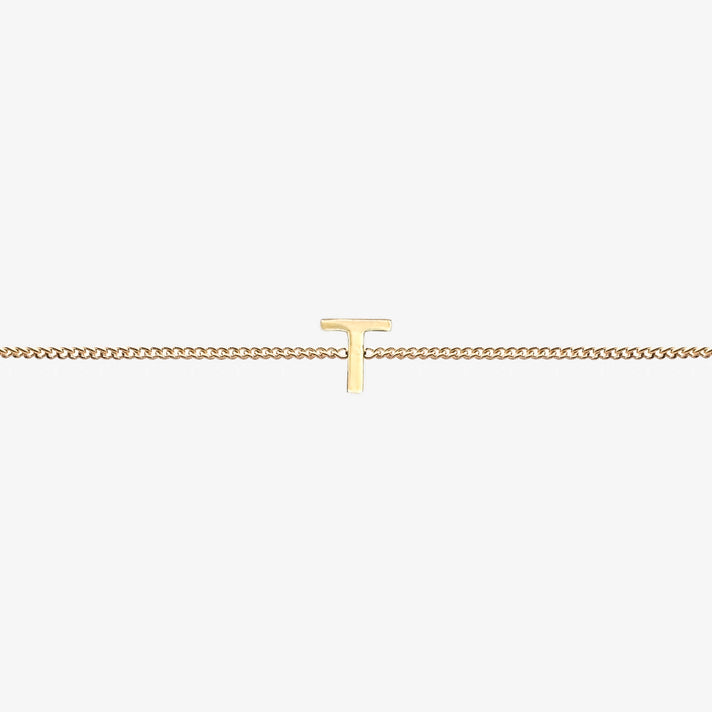  Maia Initial Bracelet with initial pendant on a delicate 18k gold plated chain, perfect accessory for any occasion.