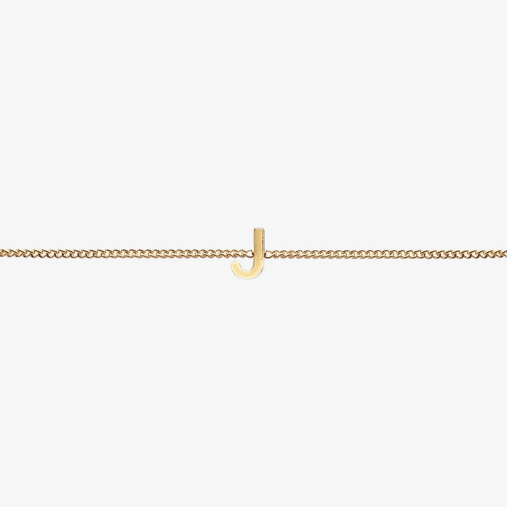  Maia Initial Bracelet with initial pendant on a delicate 18k gold plated chain, perfect accessory for any occasion.