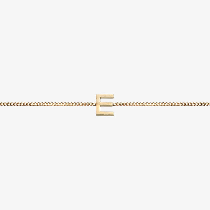  Maia Initial Bracelet with initial pendant on a delicate 18k gold plated chain, perfect accessory for any occasion.