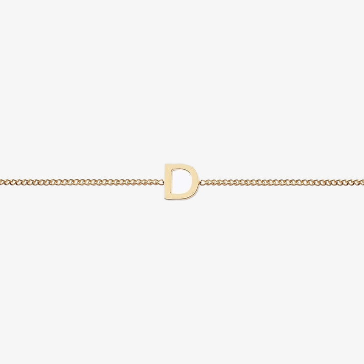  Maia Initial Bracelet with initial pendant on a delicate 18k gold plated chain, perfect accessory for any occasion.