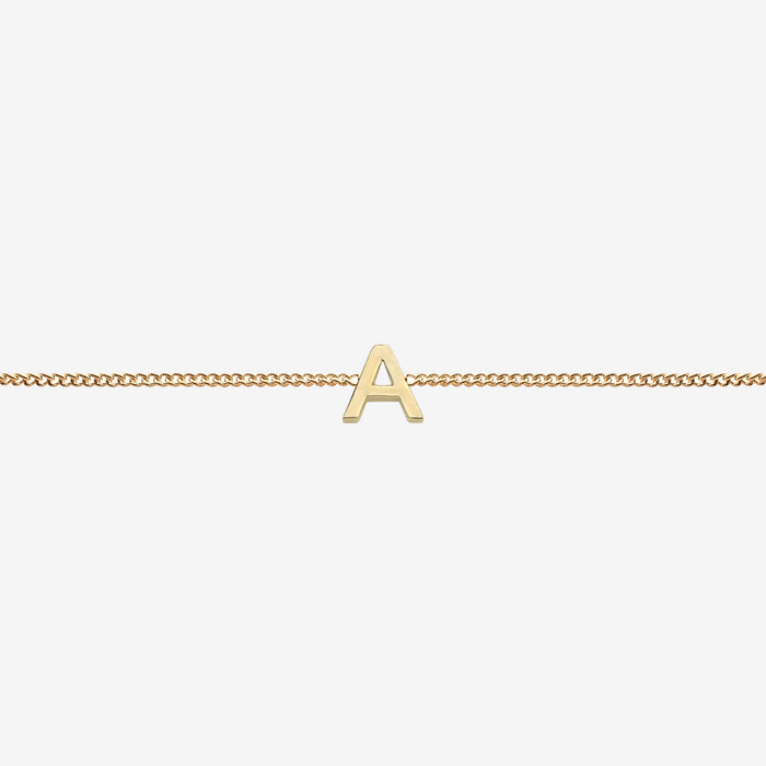  Maia Initial Bracelet with initial pendant on a delicate 18k gold plated chain, perfect accessory for any occasion.